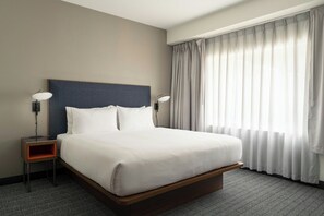 Premium bedding, down comforters, memory foam beds, in-room safe