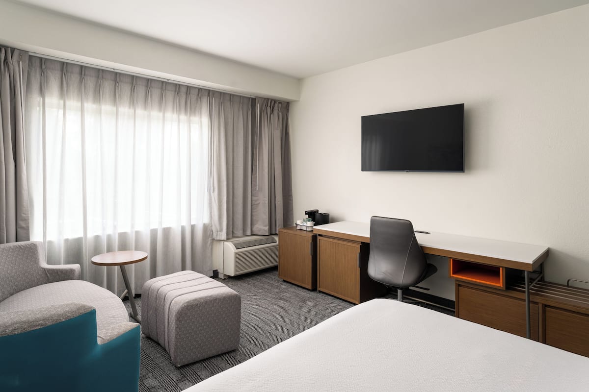 Premium bedding, down duvets, memory-foam beds, in-room safe