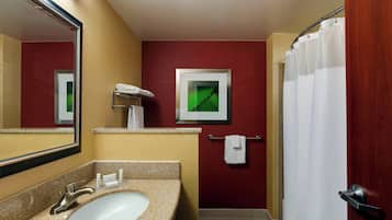 Combined shower/tub, designer toiletries, hair dryer, towels