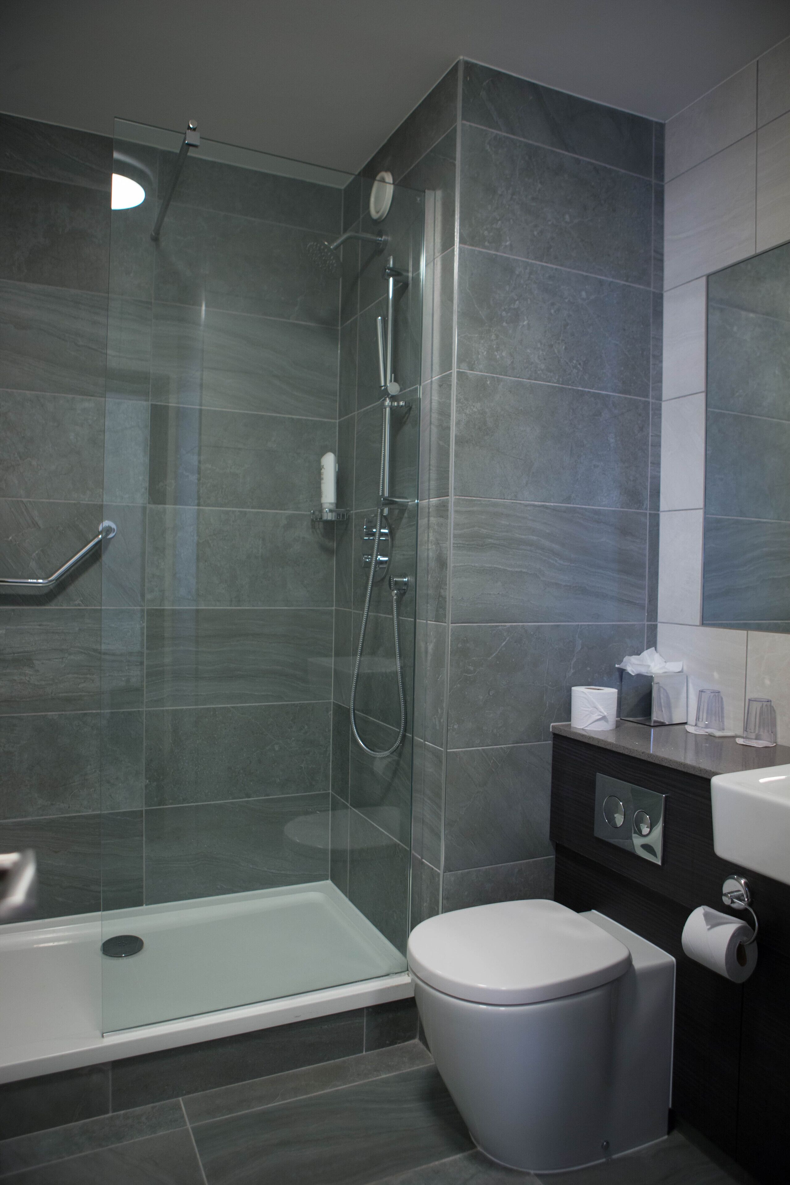 superior king & single room | bathroom | eco-friendly toiletries, hair dryer, towels