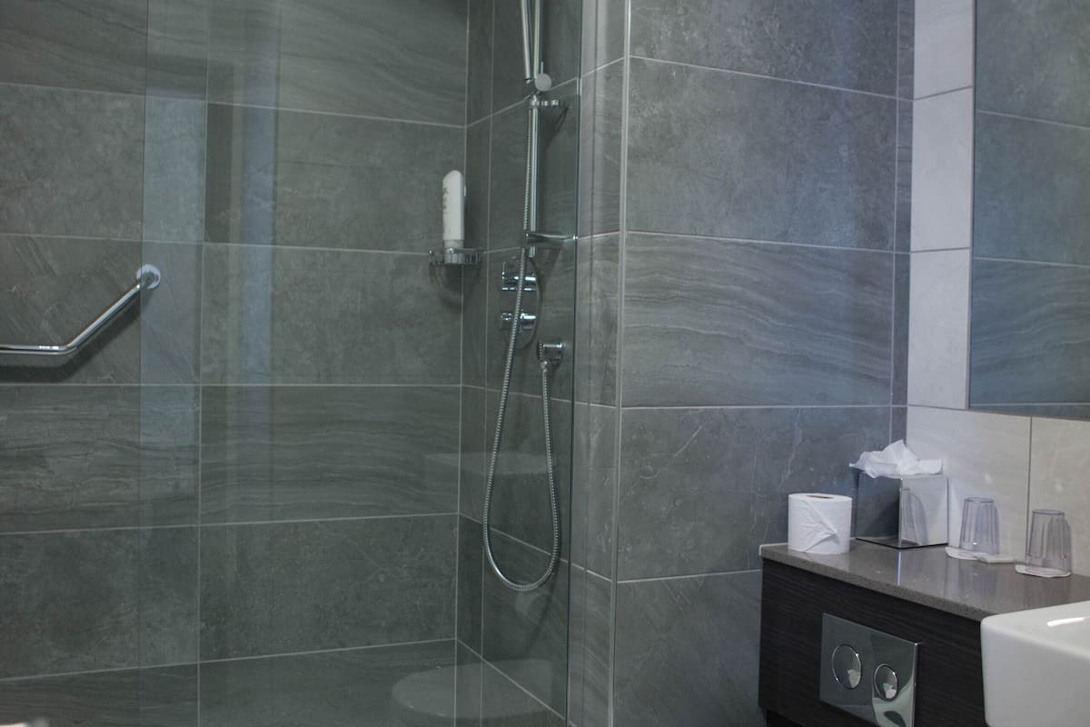 superior king & single room | bathroom | eco-friendly toiletries, hair dryer, towels