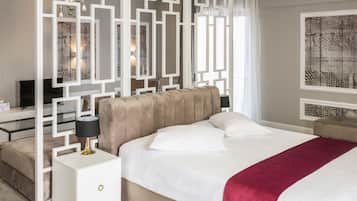 Suite de lujo | Ropa de cama de alta calidad, camas con efecto memoria y minibar