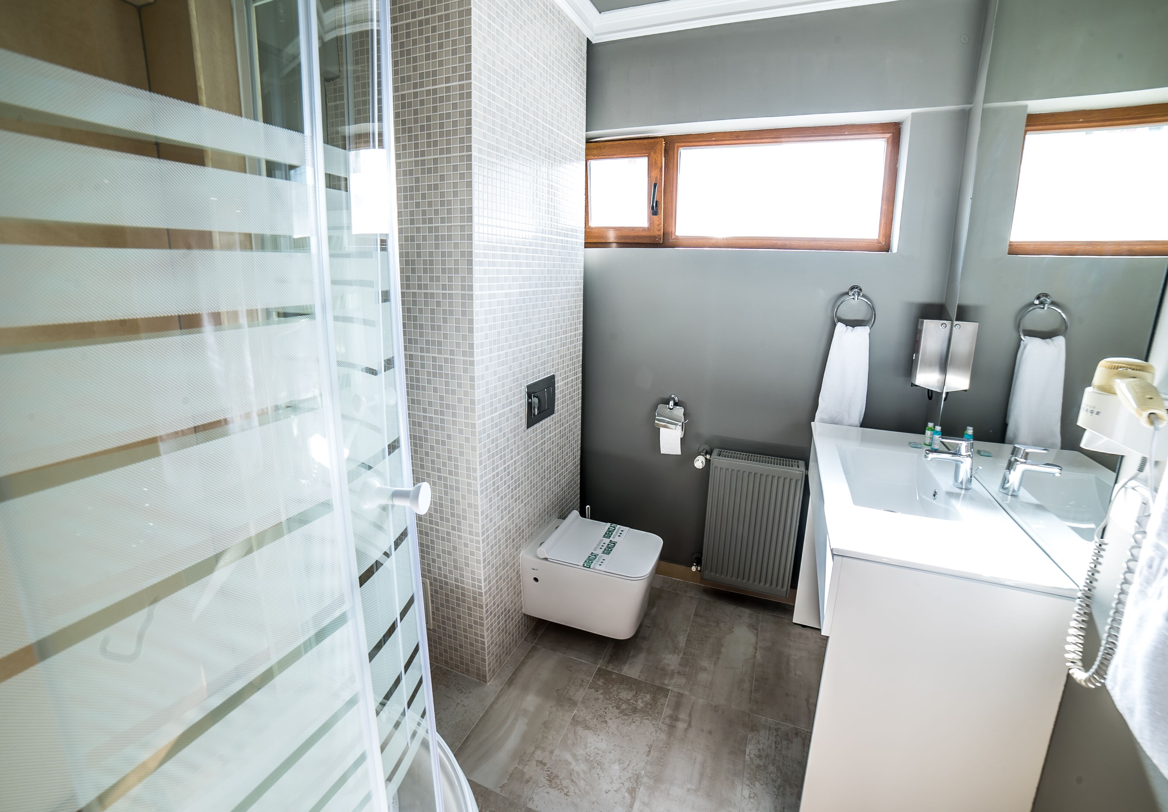 luxury suite | bathroom | shower, free toiletries, bathrobes, towels