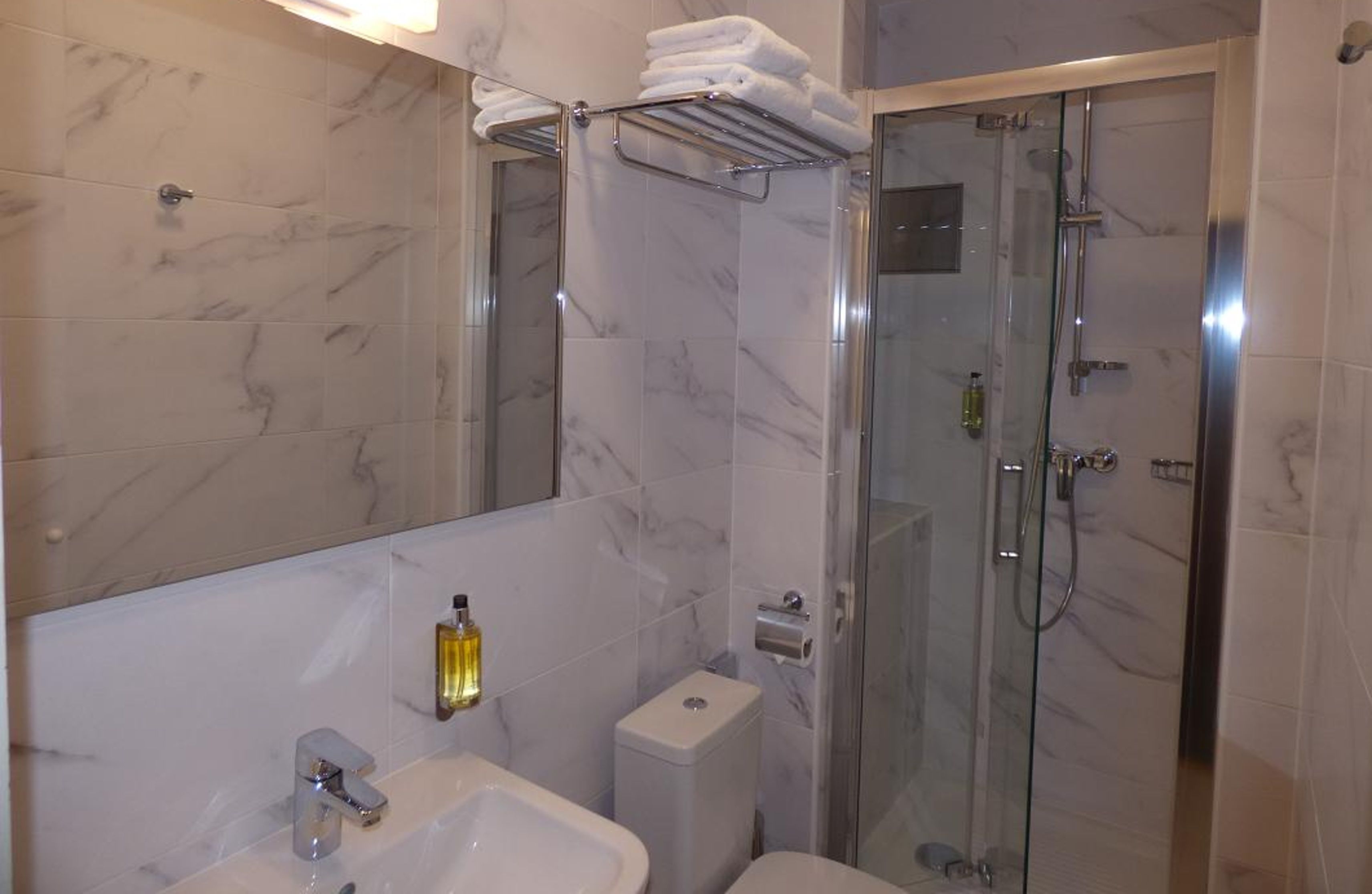 shower, free toiletries, hair dryer, towels