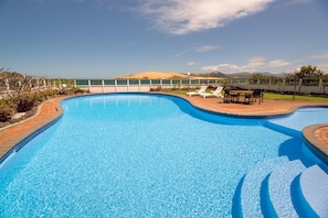 Outdoor pool, open 8:00 AM to 7:00 PM, pool umbrellas, pool loungers - The Sands Hotel (Omapere)
