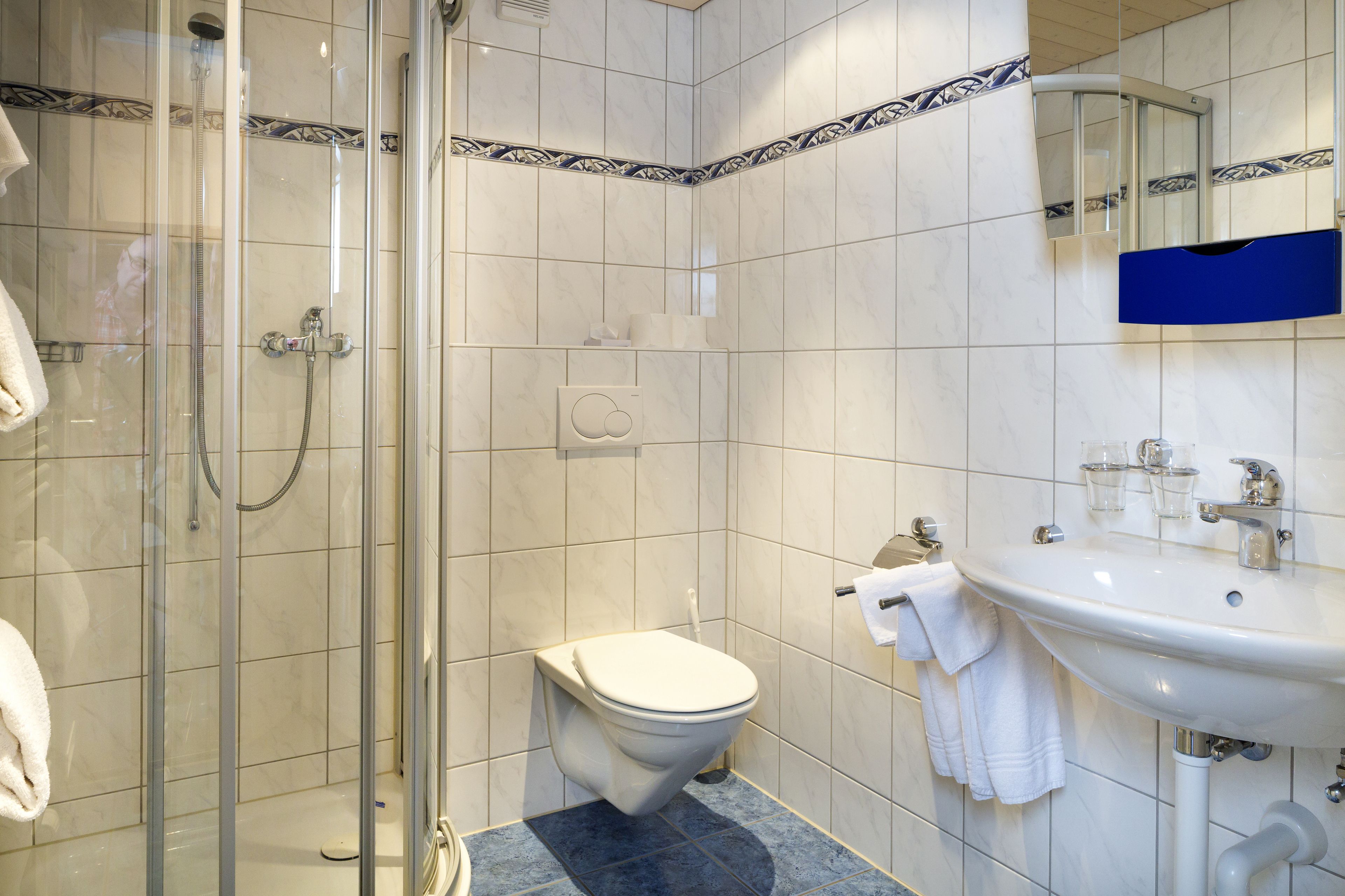 combined shower/bathtub, free toiletries, hair dryer, towels