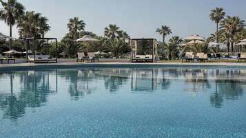 Indoor pool, outdoor pool, pool umbrellas