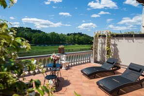 Suíte, terraço | Terraço/pátio