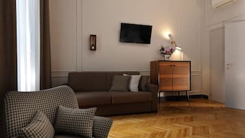 Junior Suite | Living area | Flat-screen TV