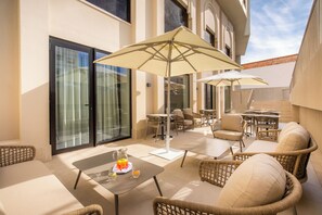 Indoor pool, outdoor pool, open 10:00 AM to 8:00 PM, pool umbrellas