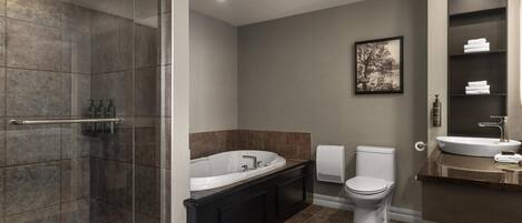Un bagno moderno con doccia a filo pavimento, vasca freestanding, WC e lavandino.