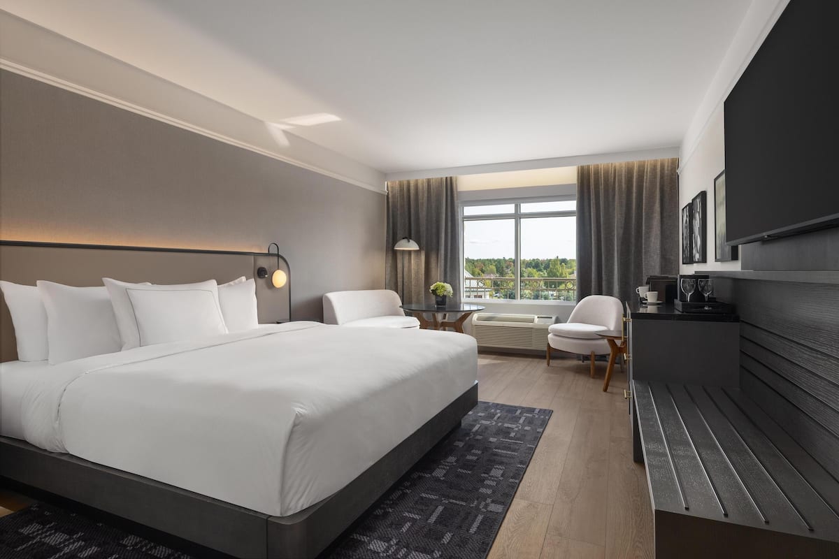 Hypo-allergenic bedding, down duvets, pillow-top beds, in-room safe