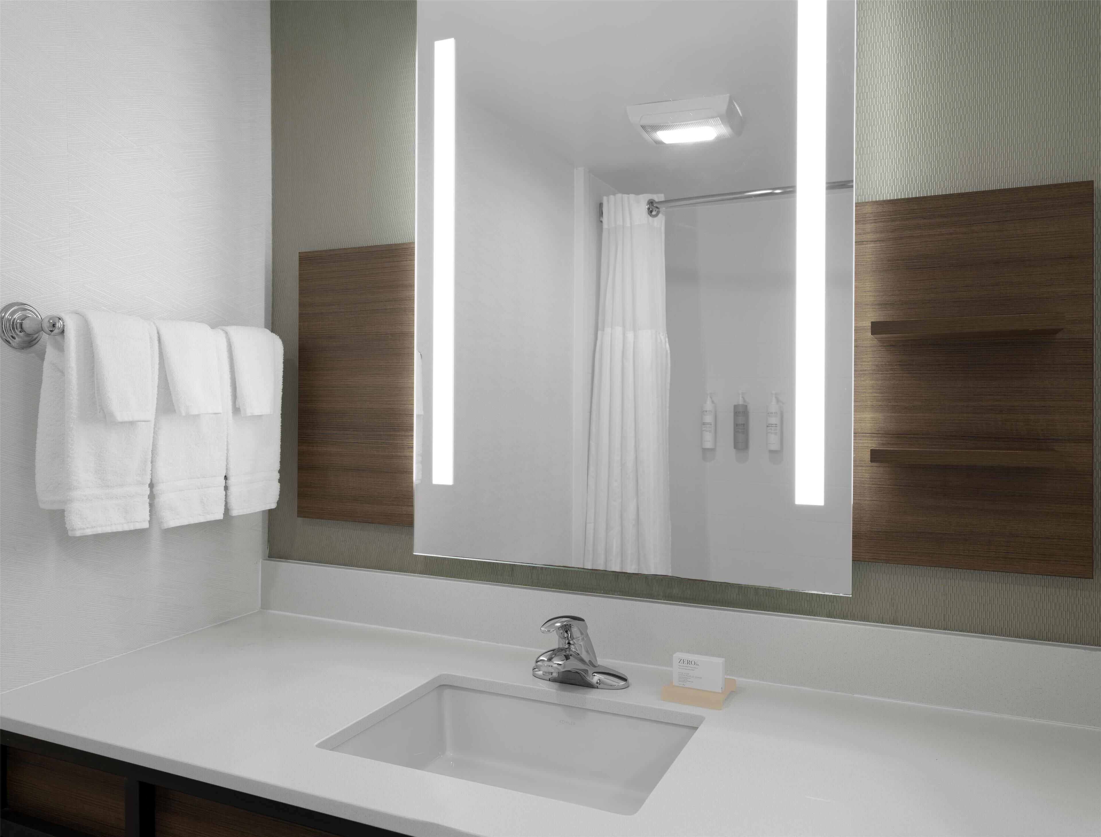 combined shower/bathtub, free toiletries, hair dryer, towels