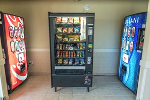 A vending machine with a variety of snacks and drinks, including Haribo Gold-Bears and Coca-Cola. - Holiday Inn Hazlet by IHG (Hazlet)