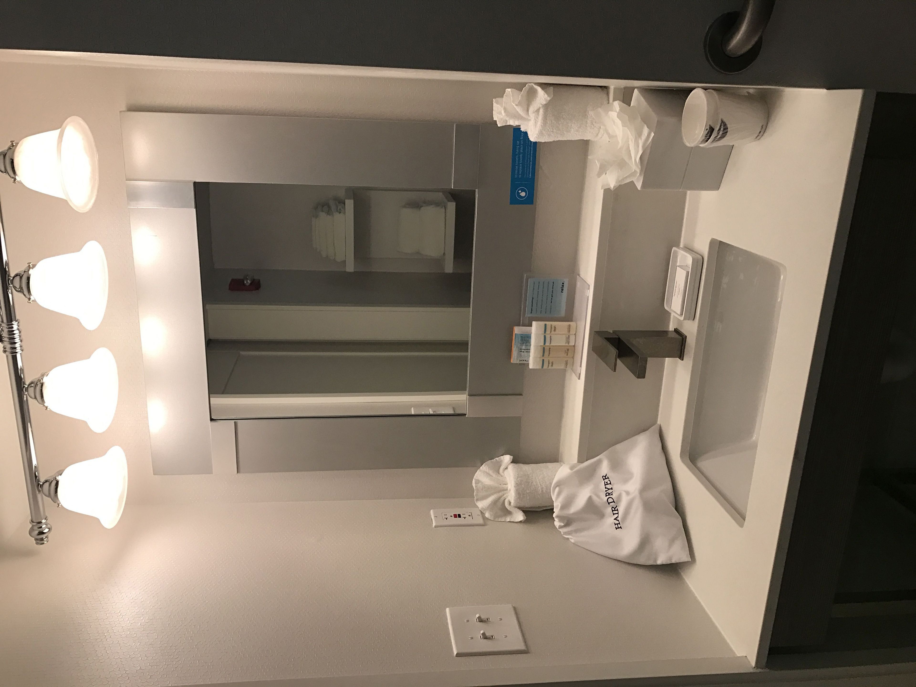 combined shower/bathtub, free toiletries, hair dryer, towels