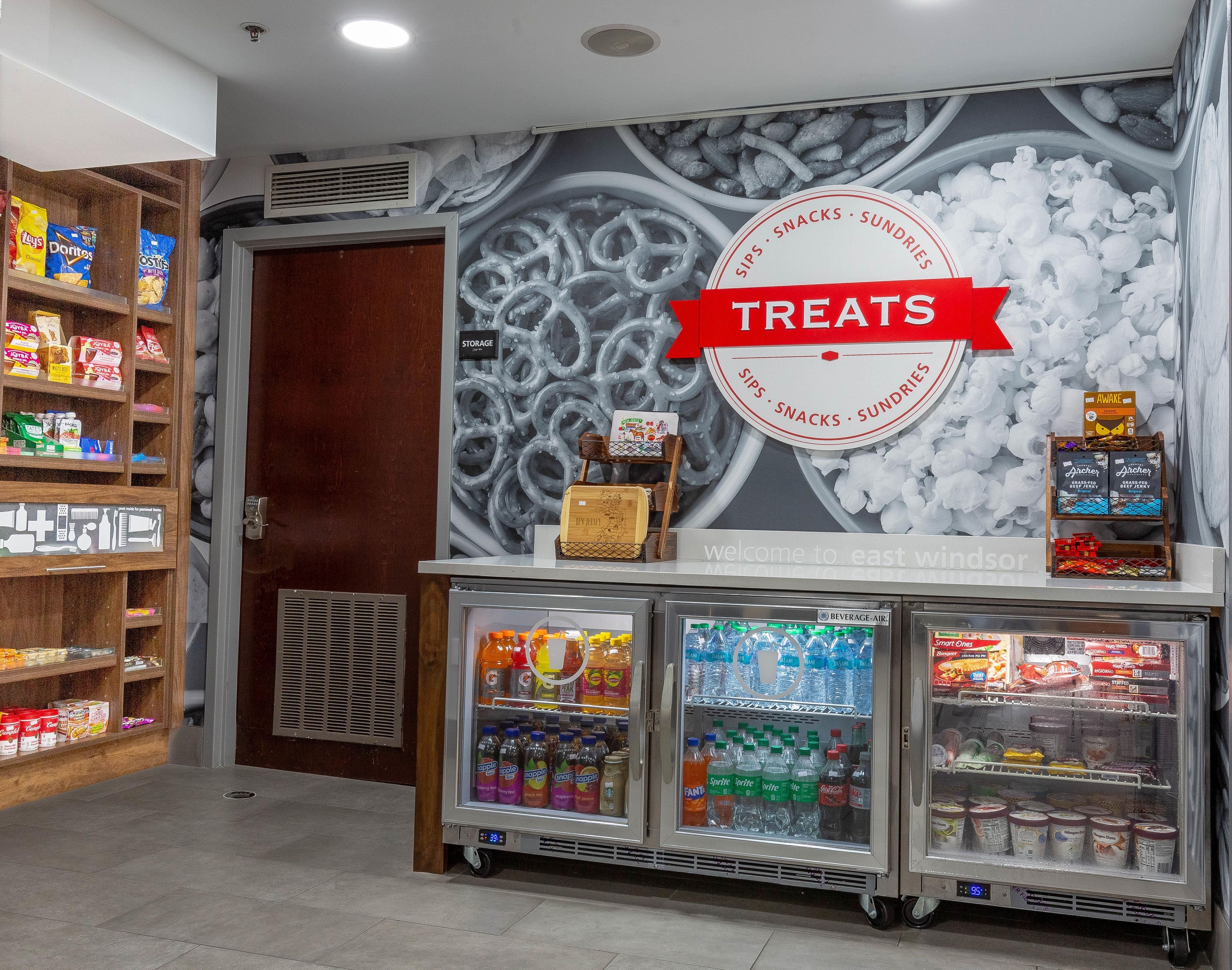 A snack and sundries section with a variety of packaged goods and beverages.