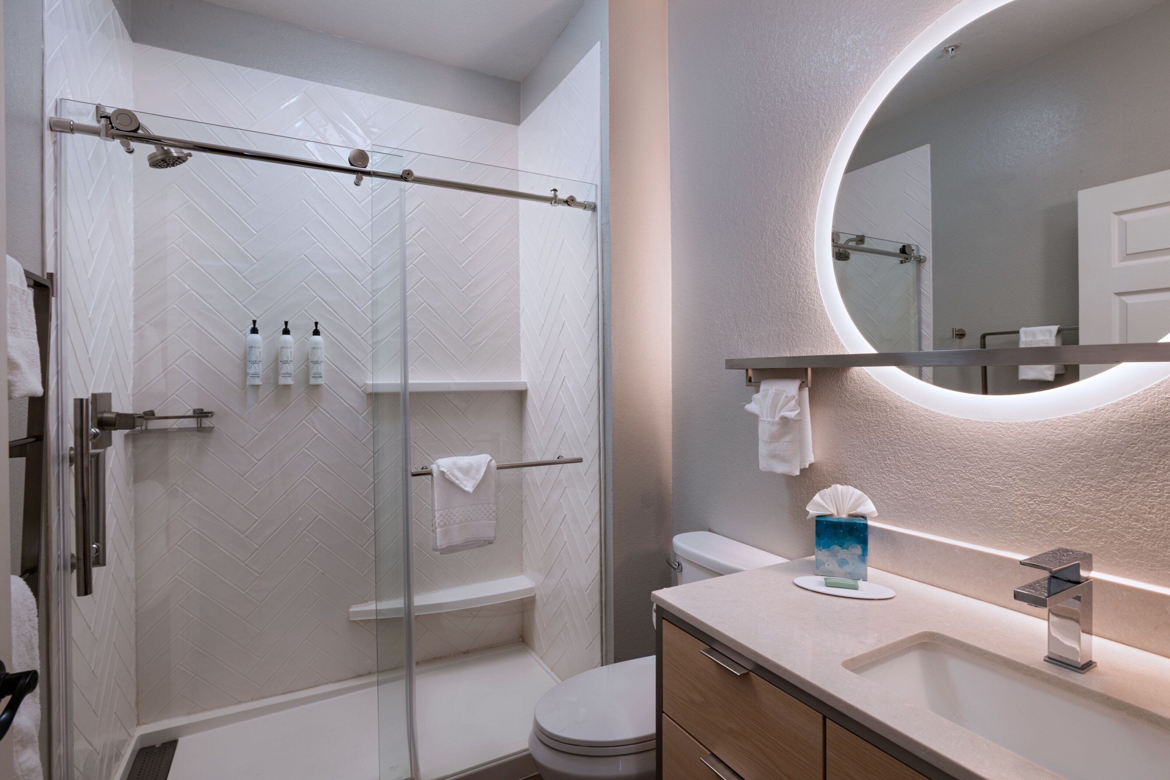 down duvets, pillow-top beds, blackout curtains, iron/ironing board