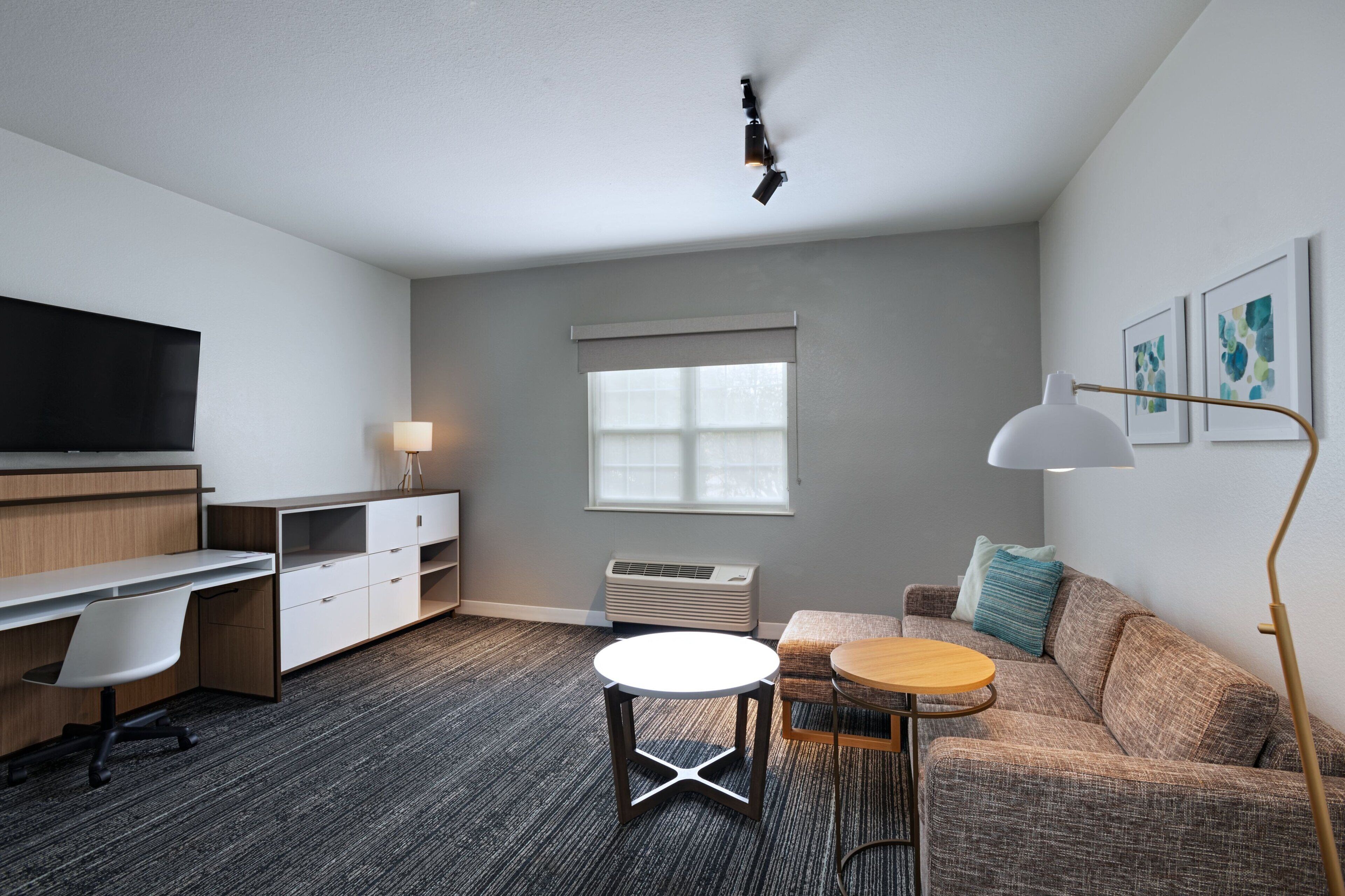 suite, 1 king bed with sofa bed | living area | flat-screen tv