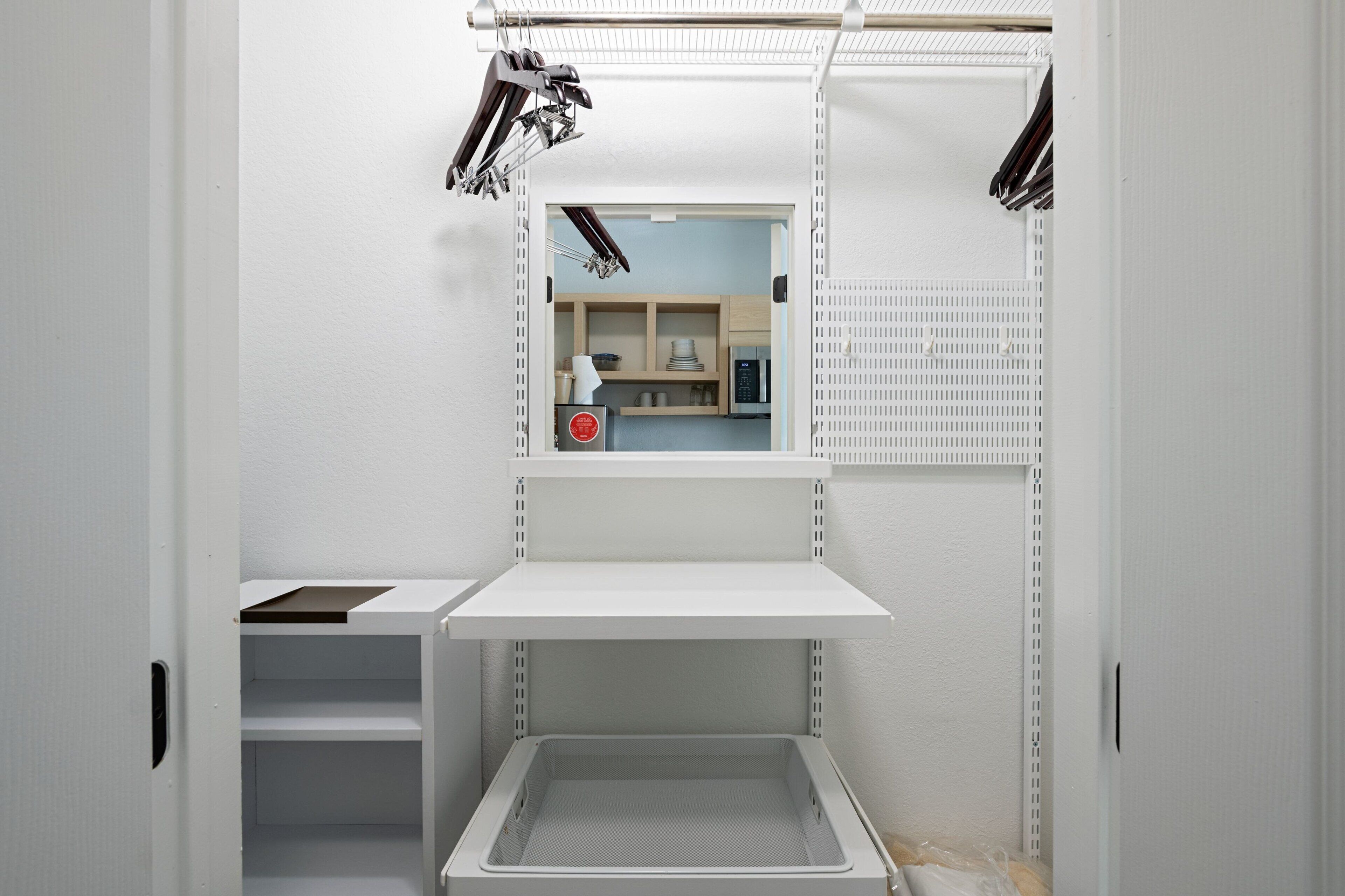 down duvets, pillow-top beds, blackout curtains, iron/ironing board