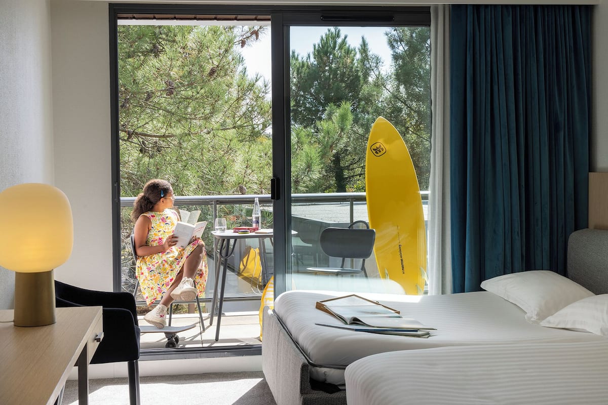 family quadruple room, 1 queen bed, non smoking (twin bed on request; with sofabed) | minibar, in-room safe, desk, laptop workspace