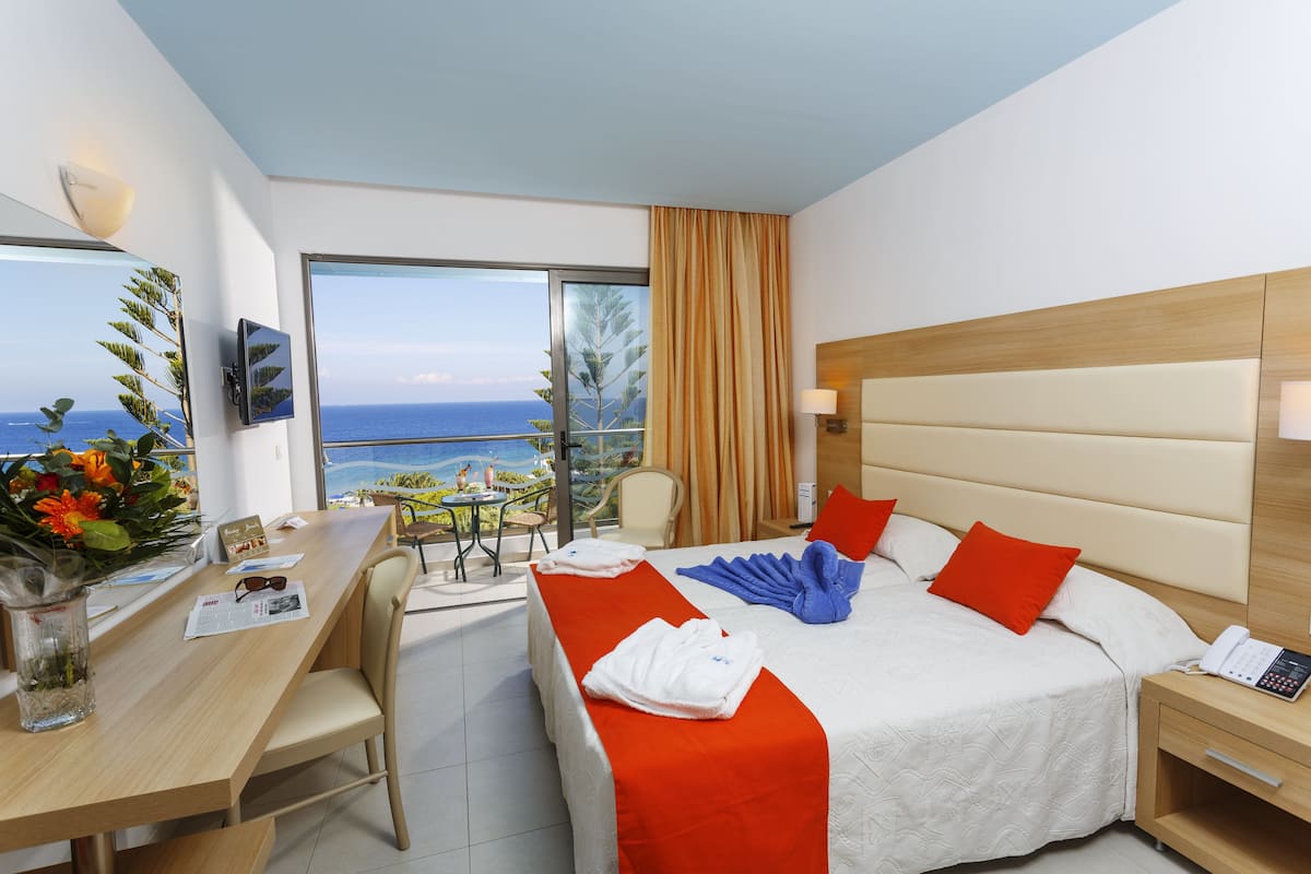 superior twin room, sea view | 1 bedroom, in-room safe, desk, laptop workspace