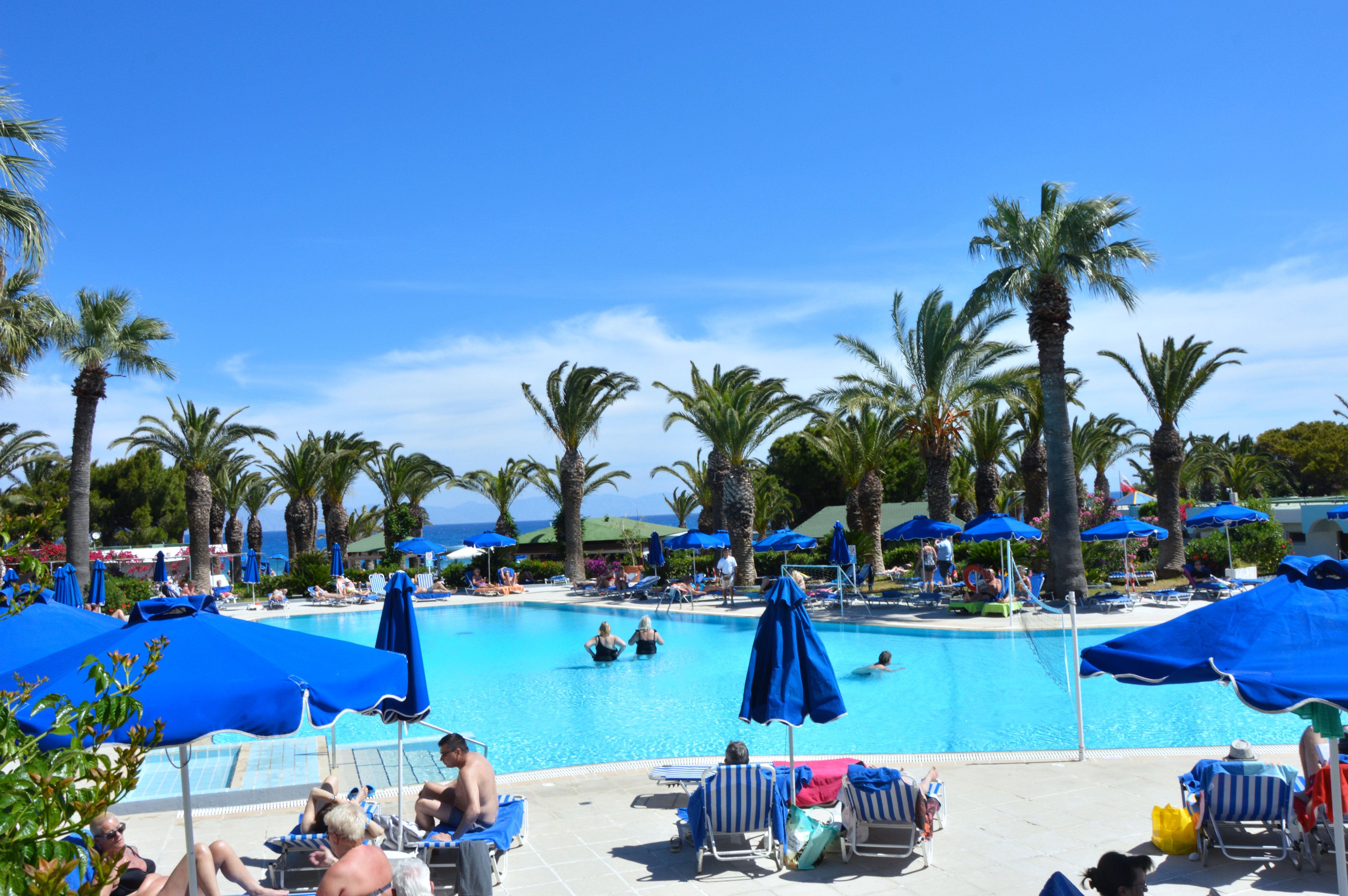 outdoor pool, pool umbrellas, pool loungers