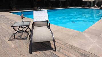 Outdoor pool, pool umbrellas, pool loungers