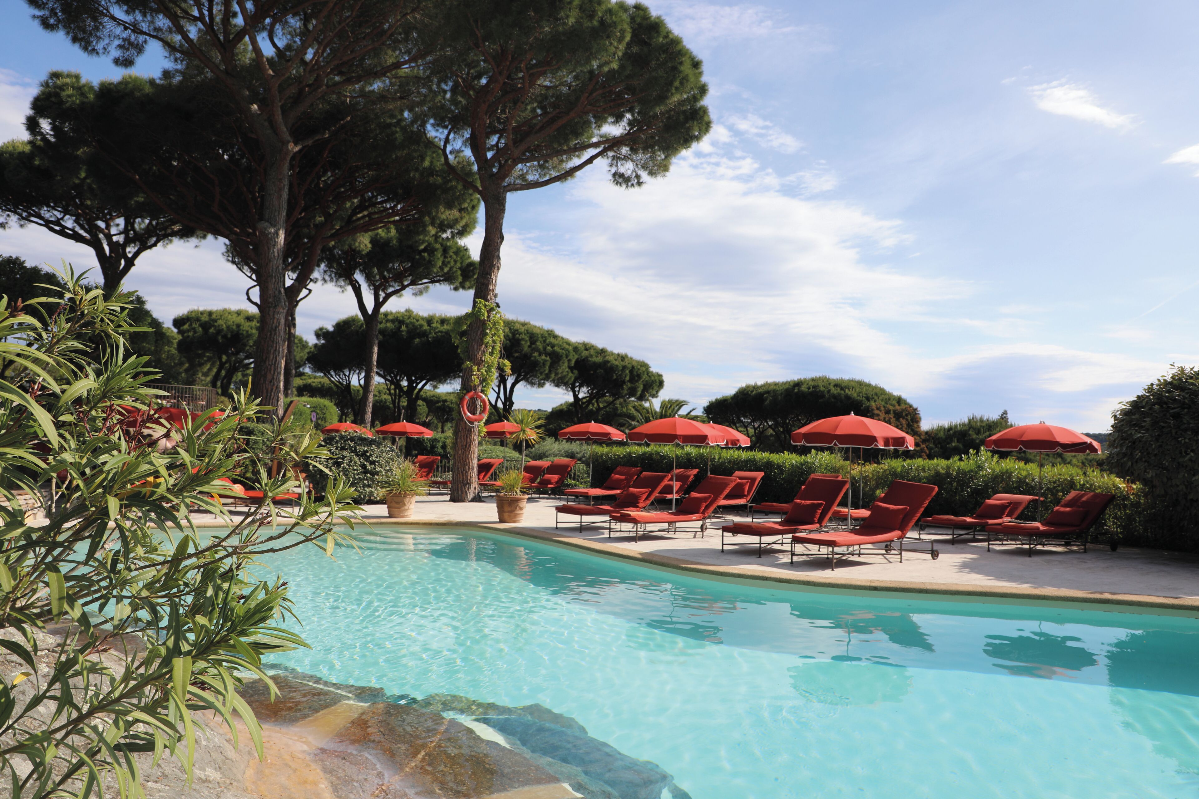 outdoor pool, pool umbrellas, pool loungers