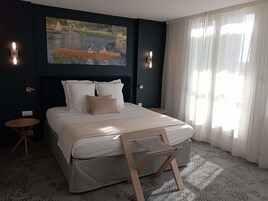 1 dormitorio, ropa de cama de alta calidad, minibar y caja fuerte