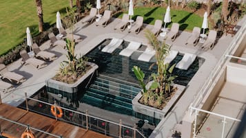 Indoor pool, seasonal outdoor pool, pool umbrellas, sun loungers