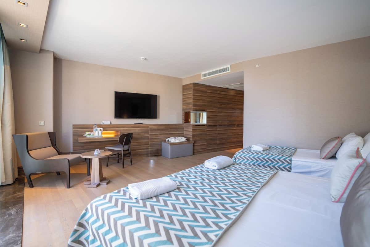 Ropa de cama de alta calidad y minibar con artículos gratuitos