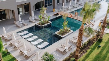 Indoor pool, seasonal outdoor pool, pool umbrellas, sun loungers
