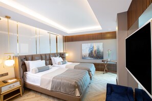 Premium bedding, free minibar, in-room safe, desk