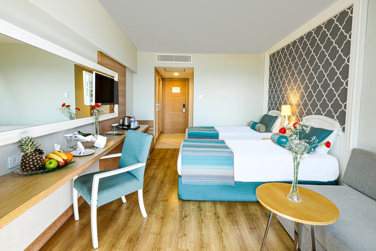 Premium bedding, free minibar, in-room safe, desk