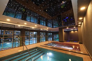 Indoor pool, 7 outdoor pools, open 7:00 AM to 7:00 PM, pool umbrellas