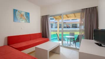 Family Suite | Living area | 32-inch LCD TV with satellite channels, TV