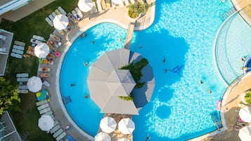 Indoor pool, outdoor pool, pool umbrellas, pool loungers