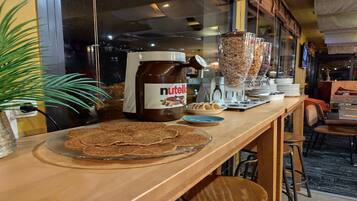 Daily buffet breakfast (EUR 18 per person)