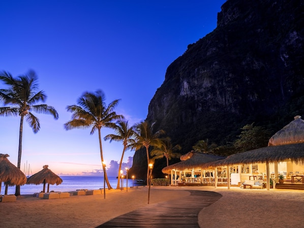 On the beach, sun-loungers, beach umbrellas, beach towels