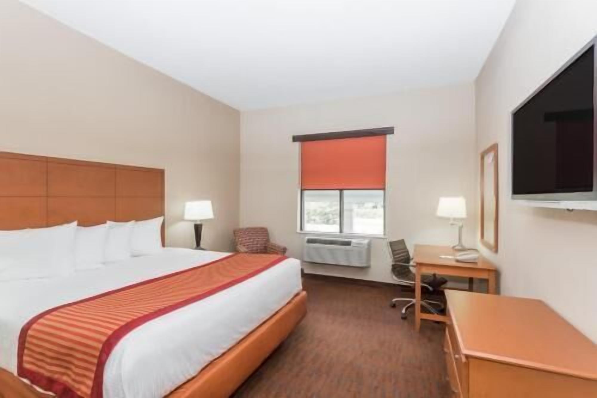 Premium bedding, down comforters, desk, blackout drapes