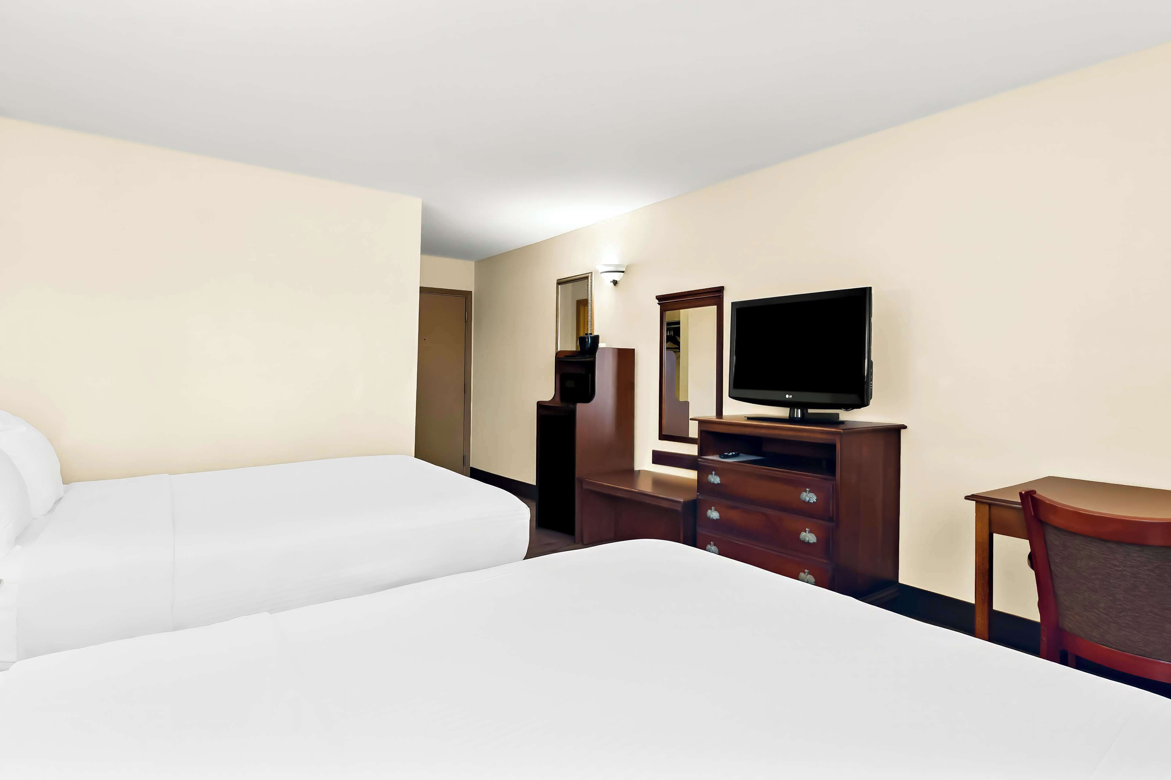 standard room, 2 queen beds, non smoking, refrigerator & microwave | 1 bedroom, pillow-top beds, desk, laptop workspace