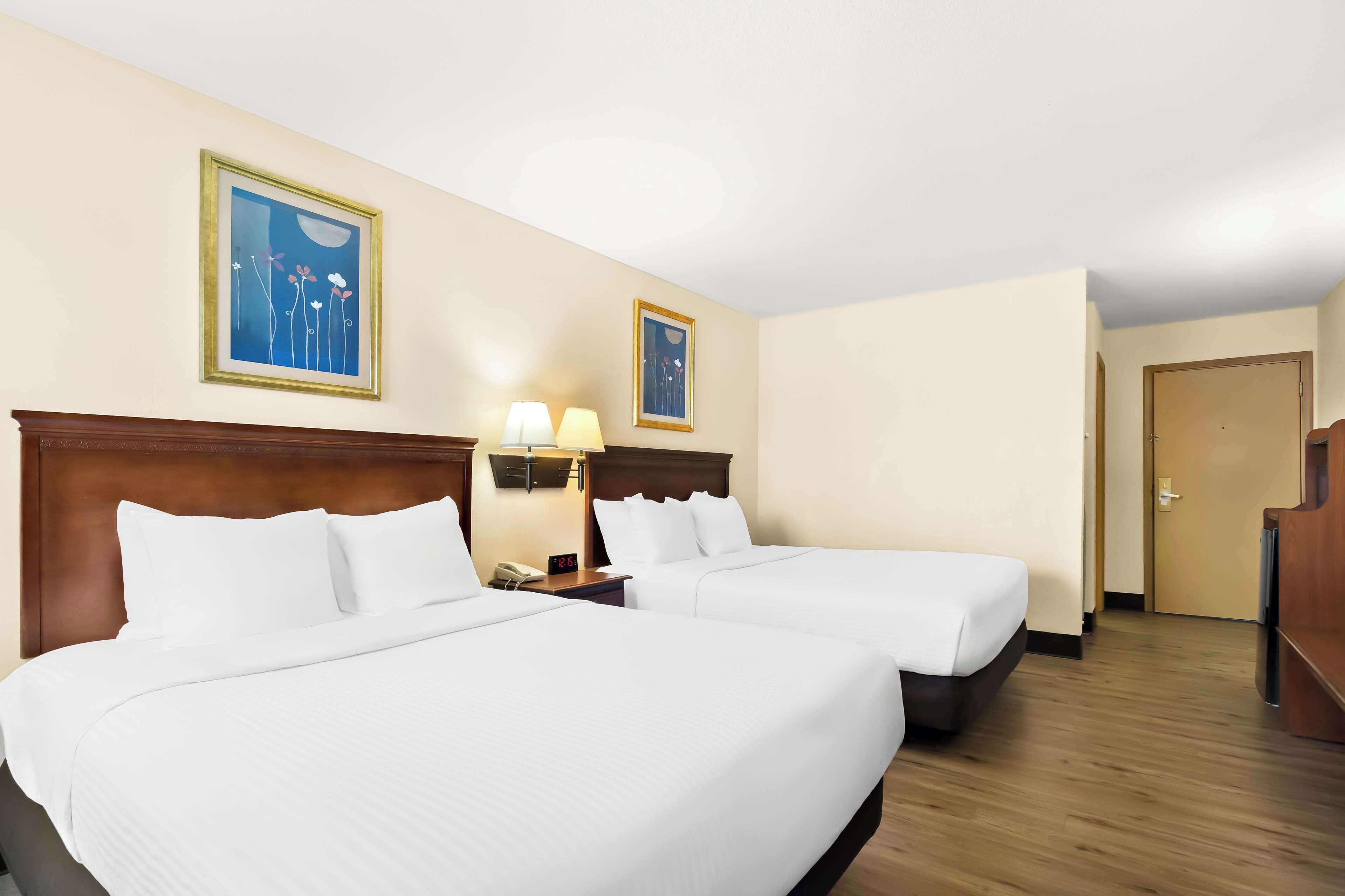 Standard Room, 2 Queen Beds, Non Smoking, Refrigerator & Microwave | Pillowtop beds, desk, laptop workspace, iron/ironing board