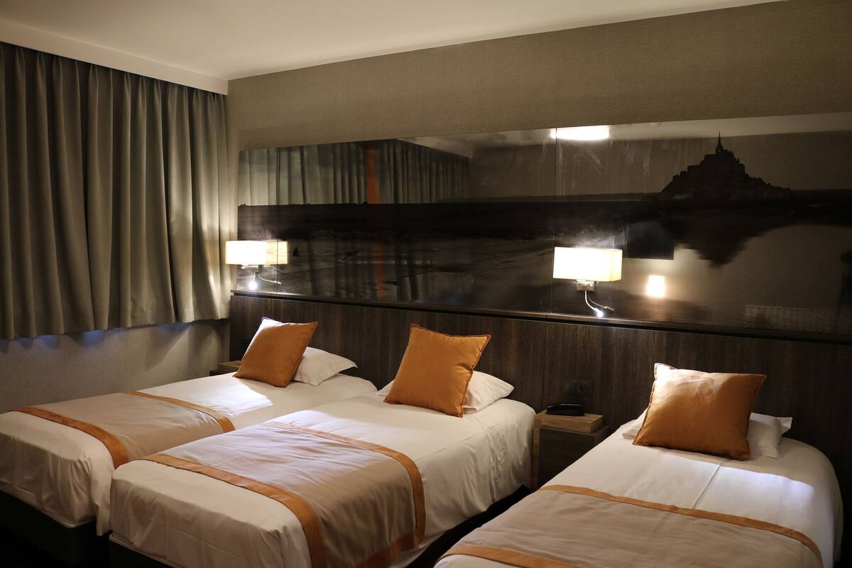 Desk, blackout curtains, free WiFi, bed sheets