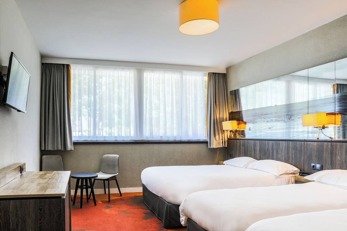 Desk, blackout curtains, free WiFi, bed sheets