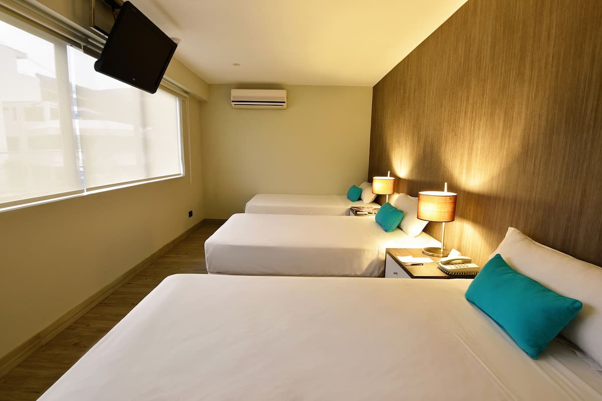 Ropa de cama de alta calidad y minibar