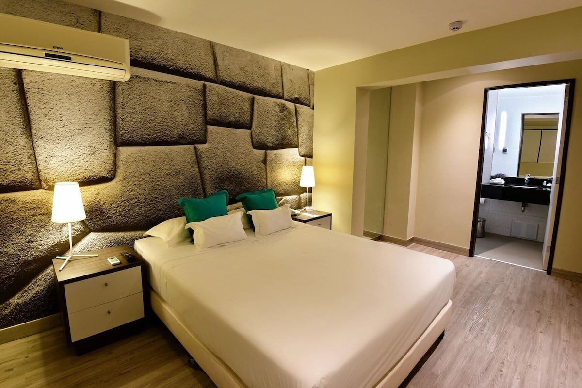 Premium bedding, down comforters, minibar, in-room safe
