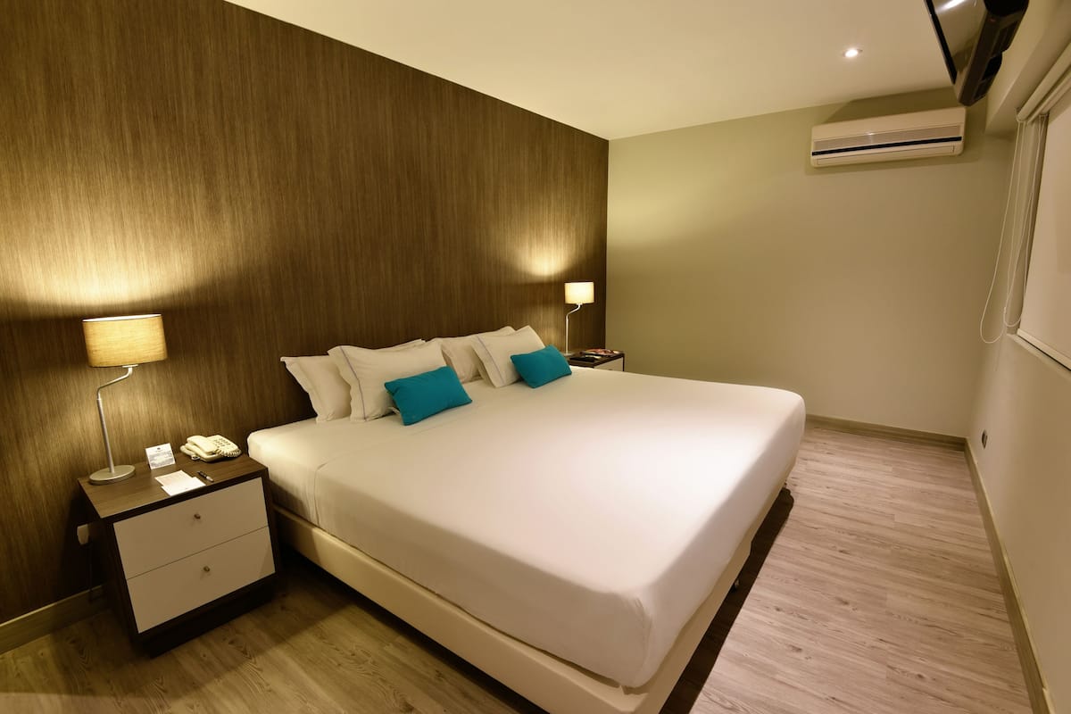 Ropa de cama de alta calidad y minibar