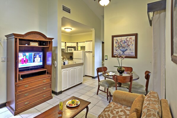 Fridge, microwave, coffee/tea maker, cookware/dishes/utensils