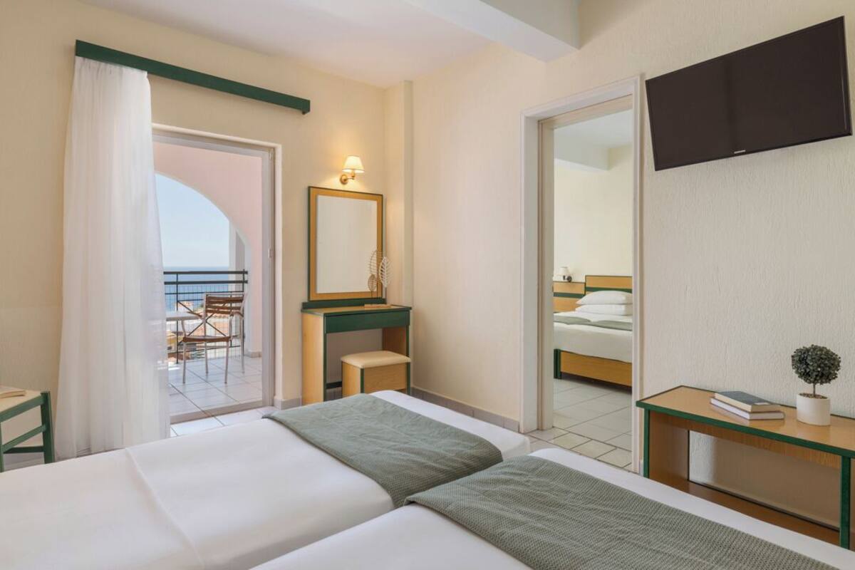 Family Room, 2 Bedrooms, Non Smoking, Partial Sea View | Hypo-allergenic bedding, in-room safe, desk, soundproofing