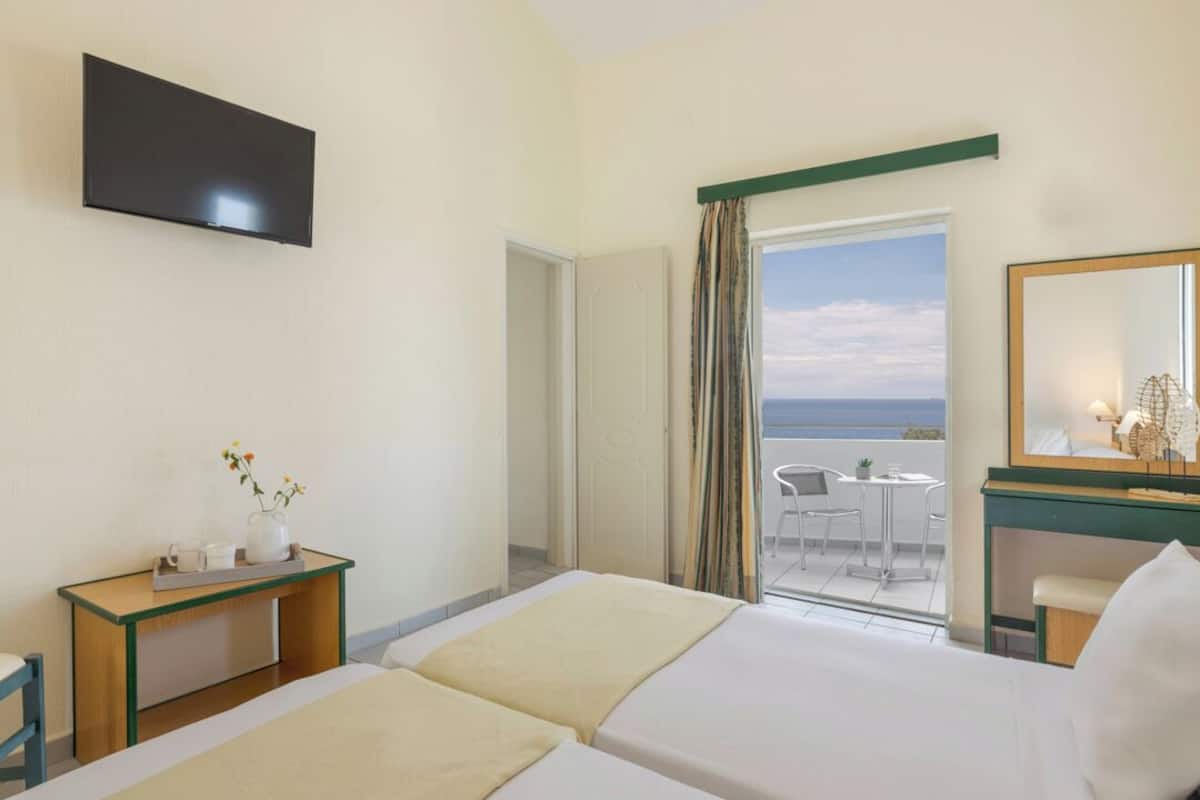 Family Room, 2 Bedrooms, Non Smoking, Sea View | Hypo-allergenic bedding, in-room safe, desk, soundproofing